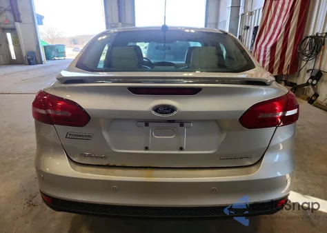 2017 Ford Focus Titanium from USA, damaged, VIN 1FADP3J27HL287867